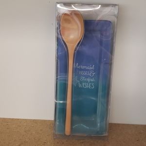 Mermaid kisses spoon rest with spoon